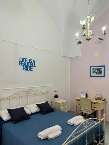 Postel nebo postele na pokoji v ubytování Meta Salento Rooms