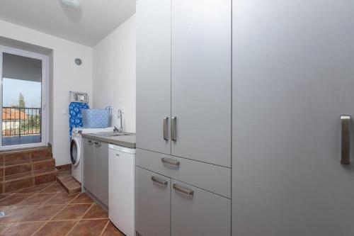 Kuchyň nebo kuchyňský kout v ubytování Penthouse Lorena