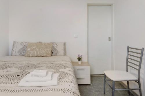 Кровать или кровати в номере Funchal House