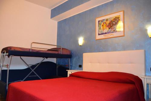 Ένα ή περισσότερα κρεβάτια σε δωμάτιο στο Diana Inn Accommodations