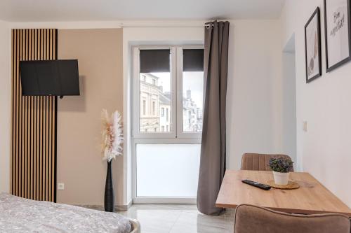 Ένα ή περισσότερα κρεβάτια σε δωμάτιο στο Apartments Cologne