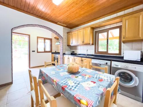 a kitchen with a table with a pumpkin on it at Can Pep Yern 1 in Playa Migjorn