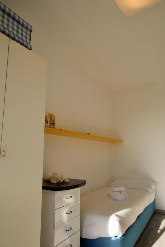 Ένα ή περισσότερα κρεβάτια σε δωμάτιο στο Casa Giusy
