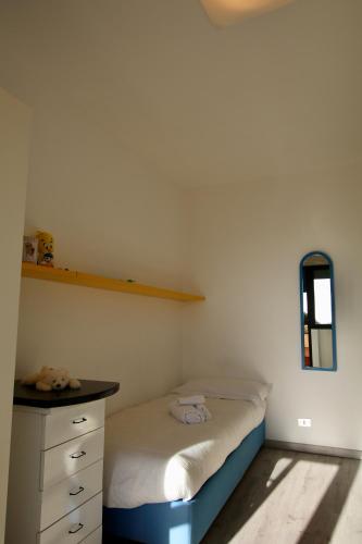 Ένα ή περισσότερα κρεβάτια σε δωμάτιο στο Casa Giusy
