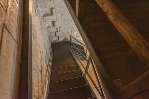 an overhead view of a staircase in a building at Suite dei Longobardi in Lecce