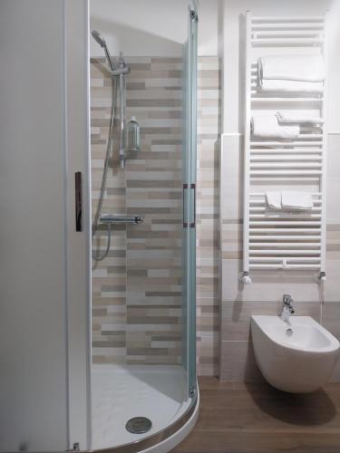 a bathroom with a shower and a sink at B&B La Dolce Sosta in Fonni