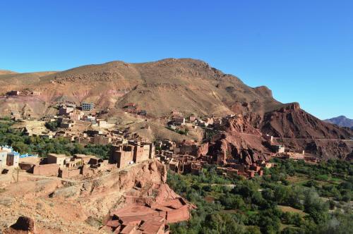 a village on the side of a mountain at Citadelle Gorges in Ait Ben Ali