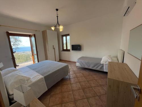 Postel nebo postele na pokoji v ubytování SKY VIEW Villa