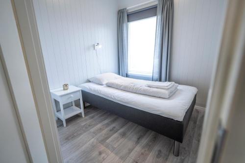 Koselig soverom med vind mot dalen