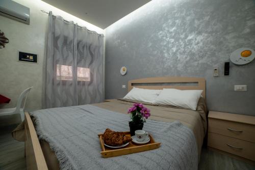 Posteľ alebo postele v izbe v ubytovaní B&B La Colonna