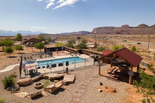 an overhead view of a pool in the desert at Sun Outdoors Canyonlands Gateway in Moab