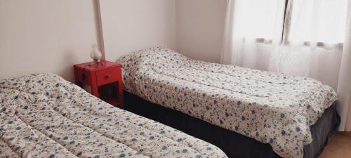 Una cama o camas en una habitación de Dpto. 2 dormitorios totalmente equipado