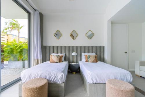  Villa5 - Peace of Heaven Villa in Aruba -  Room  picture :   Tea/Coffee maker    TV    Air conditioning                           