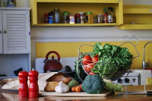 a bunch of vegetables on a cutting board on a counter at Free Spirit Hostel Guadalajara in Guadalajara