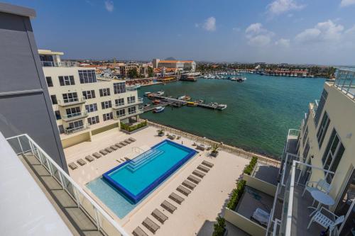a view of a body of water from a building at Put On Your Red Shoes And At This Condo in Madiki