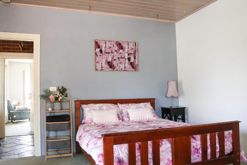 Postel nebo postele na pokoji v ubytování Jardine Lodge - Can sleep 22!