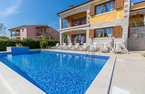 Family friendly house with a swimming pool Buici, Porec - 19720