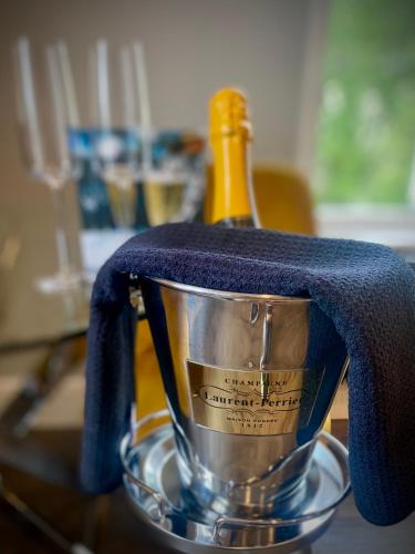 a kitchen mixer with a towel on top of it at 3 West End Boutique Apartment in Bowness-on-Windermere