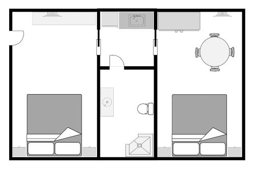 a black and white diagram of a bathroom at Cattlemans Country Motor Inn & Serviced Apartments in Dubbo