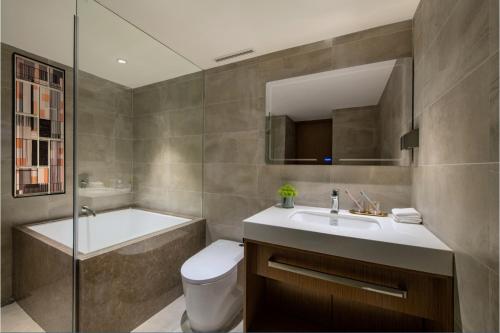 A bathroom at Guangzhou Hotel - Haizhu square metro station & close to Beijing road