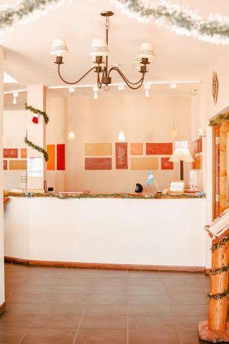 a large room with a large white counter top at Hotel Spa Nieves Del Cerro in Caviahue