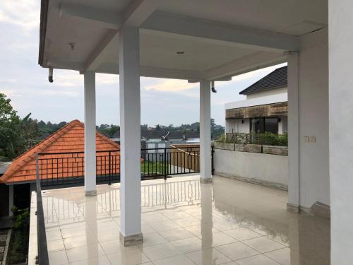 - une vue depuis le balcon d'une maison dans l'établissement Andrew Villa Bali, à Canggu