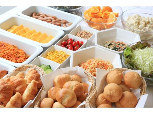 a group of white containers filled with different types of food at Smile Hotel Sasebo in Sasebo