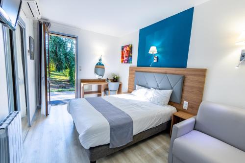 Posteľ alebo postele v izbe v ubytovaní Le Clos Grand