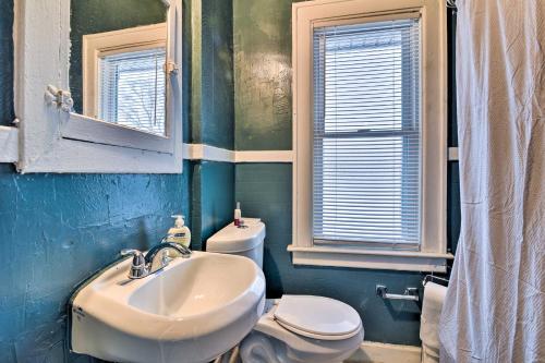 a bathroom with a sink and a toilet at Awesome Detroit Apartment Less Than 3 Mi to Midtown! in Detroit