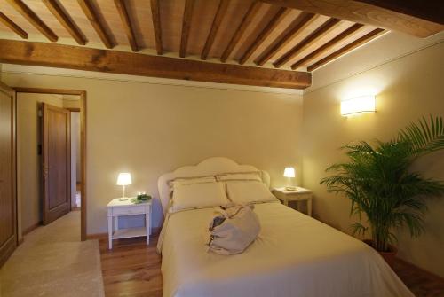 Katil atau katil-katil dalam bilik di Borgo Canalicchio Di Sopra Relais