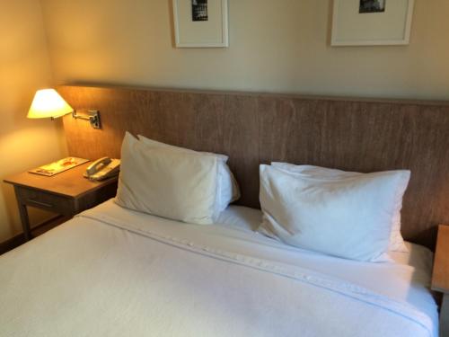Cama o camas de una habitación en Flat na Berrini