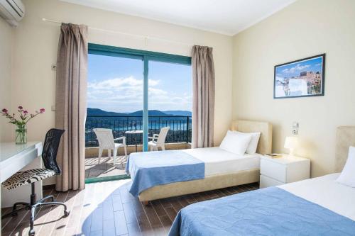 A bed or beds in a room at Villa Rigani
