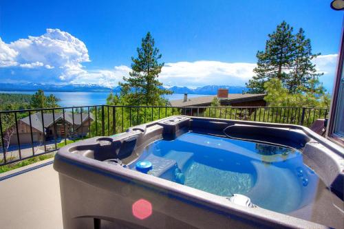 a hot tub on the balcony of a house at The Heights home in Zephyr Cove