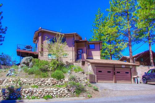 a house with a car parked in front of it at The Heights home in Zephyr Cove