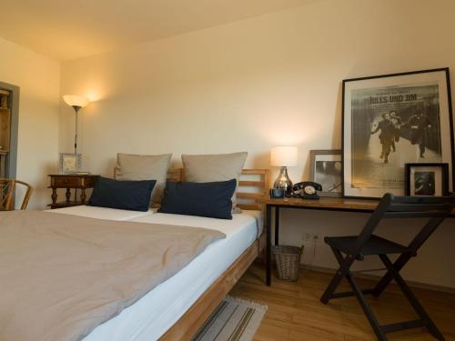 Ein Bett oder Betten in einem Zimmer der Unterkunft Müllers WohnRäume