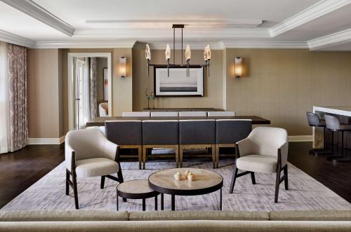 a living room with a table and chairs at Park Hyatt Aviara in Carlsbad