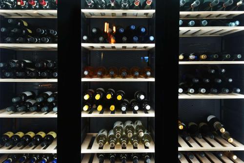 a wine cellar filled with lots of wine bottles at Radisson Blu GHR Rome in Rome