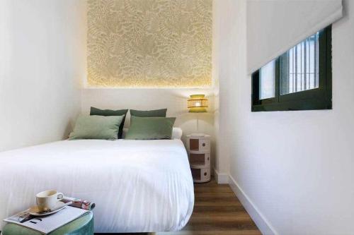 Postel nebo postele na pokoji v ubytování MonKeys Apartments San Román Deluxe
