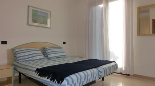 A bed or beds in a room at Three-room apartment with swimming pool in the nearby of the renowned spa