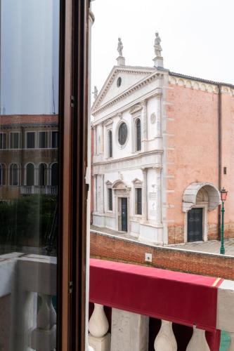 a view of a building from a window at Excess Venice Boutique Hotel & Private Spa - Adults Only in Venice