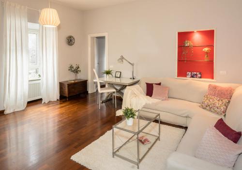 a living room with a couch and a table at 8 HOME in Rome