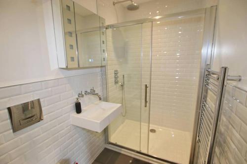 Koupelna v ubytování Queens House, Worthing