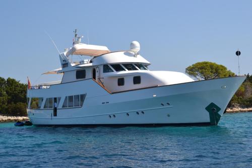 a large white boat in the water at La Voglia Matta in Monte Carlo