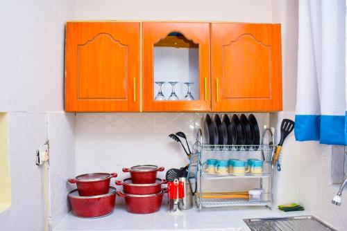 Kuchyň nebo kuchyňský kout v ubytování Lux Suites Okore Apartments Kisumu