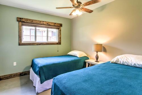 A bed or beds in a room at Lake Pepin Cottage with Patio - Walk to the Marina!