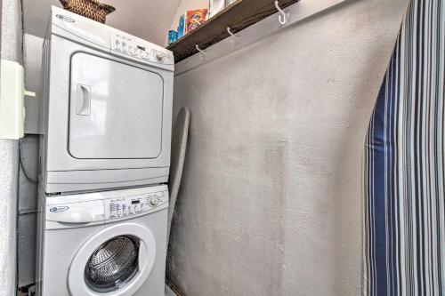 a washer and dryer sitting next to a wall at Historic Helena Home with Mtn Views - 2 Mi to Dtwn! in Helena