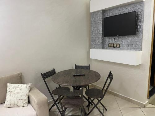 TV a/nebo společenská místnost v ubytování Appartement de luxe à deux pas de la mer
