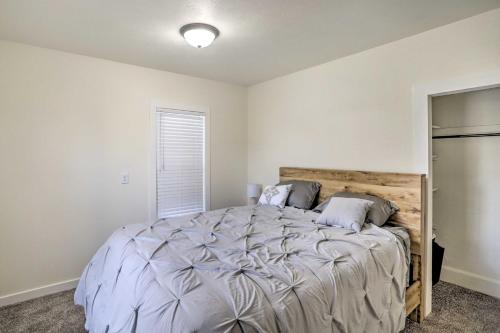 a bedroom with a bed and a window at Pet-Friendly Home Rental Near Notre Dame! in South Bend