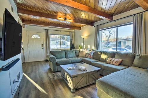 a living room with a couch and a table at Gateway to Mt Rose Ski! Reno Home with Fireplace in Reno