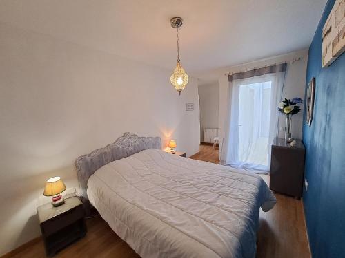 Posteľ alebo postele v izbe v ubytovaní Appartement T3 - Vue Mer - La Chaume - Au calme - La Clé Chaumoise